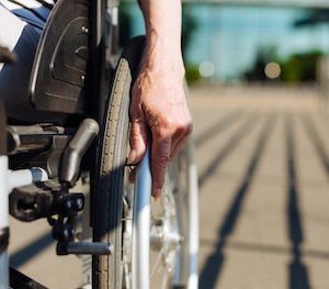 Disability Lawyer — Woman Rolling the Wheelchair in Goose Creek, SC