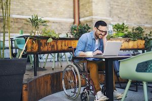 Disability Benefits — Happy Man at Cafe in Goose Creek, SC